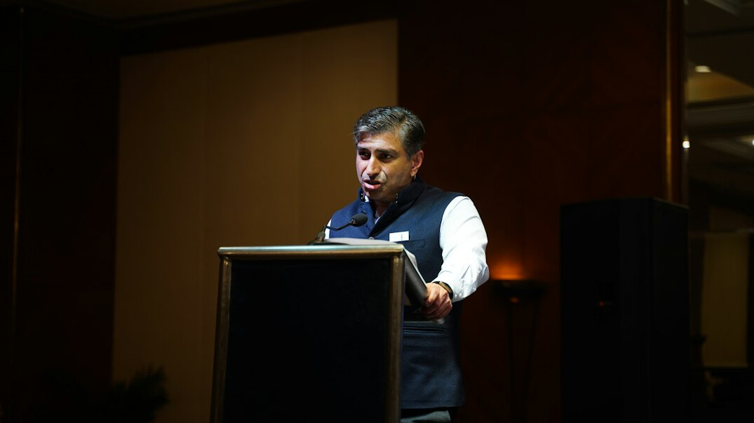 confident speaker on stage