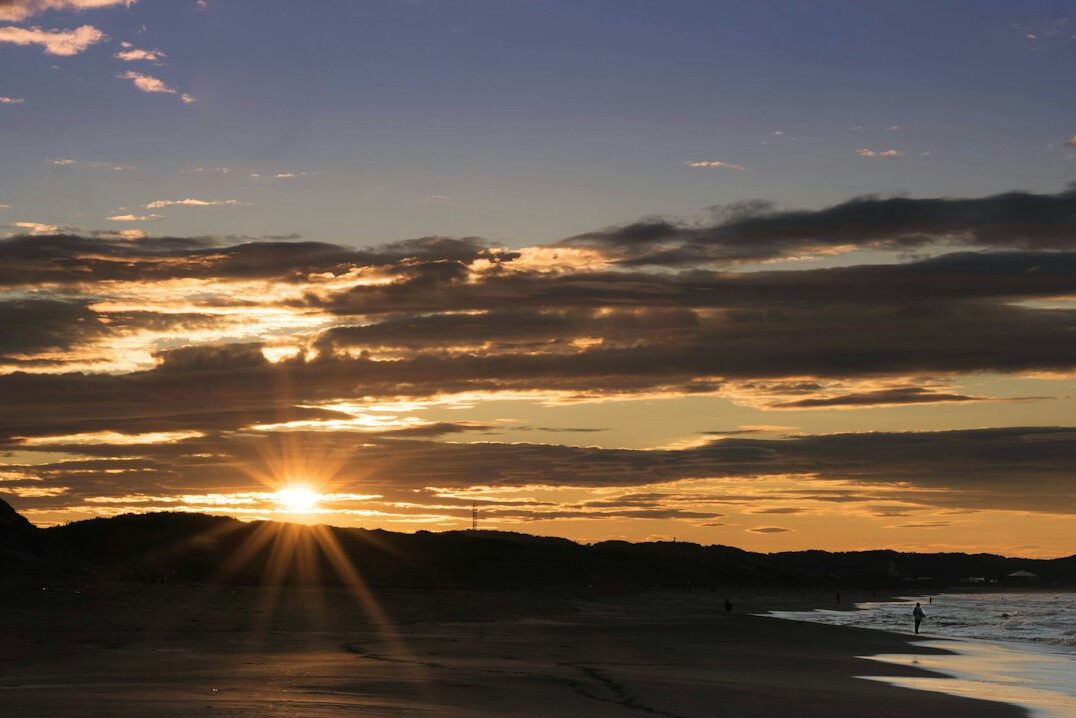 sunrise over calm landscape